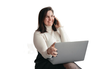A female designer uses a laptop and a phone in the office. An employee of the company is talking to a client. A happy manager in a white shirt smiles.