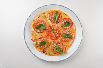 baked hot vegetarian margherita and tomato basil cheese round pizza in plate on white table western vegetarian pastry cuisine halal food hotel luxury cafe menu