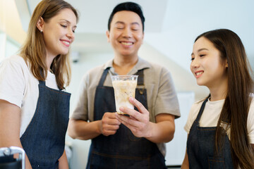 Group of restaurant - coffee shop staff or employee discussing together in the morning, coffee shop...