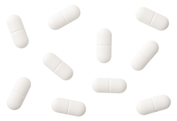 White pills isolated on white background, top view