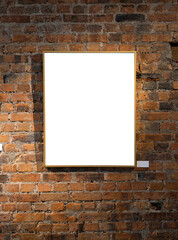 Blank picture frames on brick wall with glowing lamp, mock up