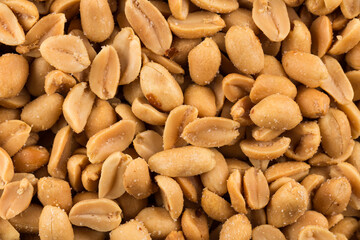 large amount of peeled salted peanuts