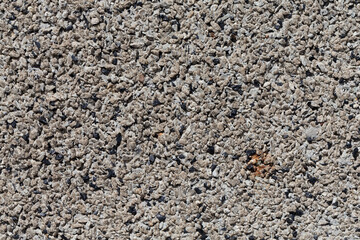 Crushed granite stones wall - close up