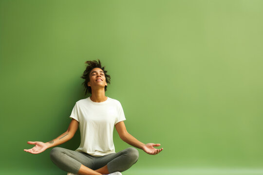 Non-binary Individual Stretching Against Green Background