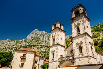 Fototapeta na wymiar Bell towers of St Tryphon Cathedral, or just Kotor Cathedral in the old town of Kotor, Montenegro
