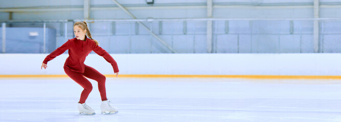 Talented and concentrated girl in red sportswear, figure skating athlete in motion, training on ice rink arena. Concept of professional sport, competition, sport school. Banner. Copy space for ad - obrazy, fototapety, plakaty