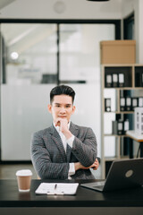 Naklejka premium Mature business man executive manager looking at laptop watching online webinar training or having virtual meeting video conference doing market research working in office..
