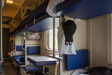 interior of a passenger railway carriage of an intercity train.