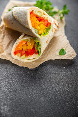 kebab vegetable taco tortilla wrap vegetarian food burrito veganfajita shawarma pita meal food snack on the table copy space food background rustic top view 