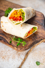 kebab vegetable taco tortilla wrap vegetarian food burrito veganfajita shawarma pita meal food snack on the table copy space food background rustic top view 