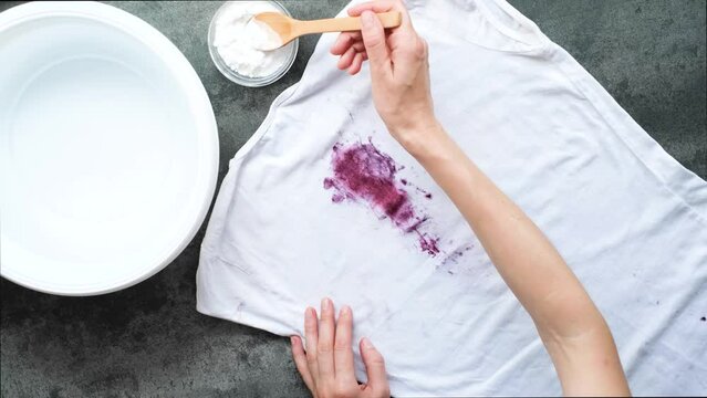 Homemade eco-friendly removing of stains on clothes with baking soda. top view. 