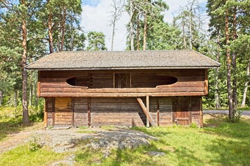 Fototapeta na wymiar Selkämä farm loft granary “kokkitalli”, Seurasaari Open-Air Museum, Helsinki, Finland.