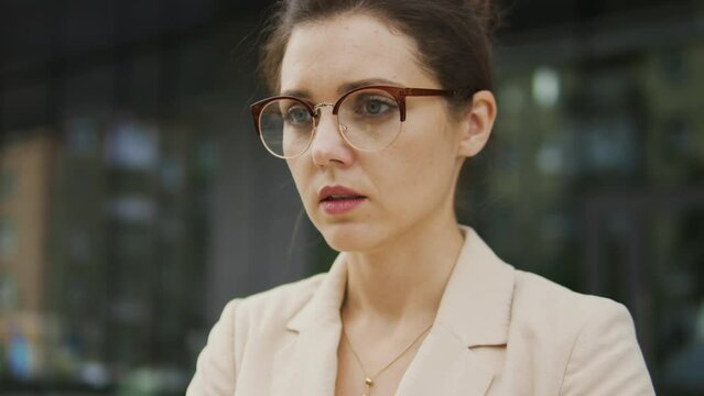 Shocked woman closing mouth with hand remembering that she forgot to make annual report for business partners at work, failed deadline, risk to be dismissed