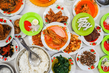aneka masakan padang, Various Padang Cuisine, A popular dish from a Padang restaurant, served on stacked plates.