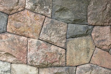 Closeup of stone wall texture or abstract background. 