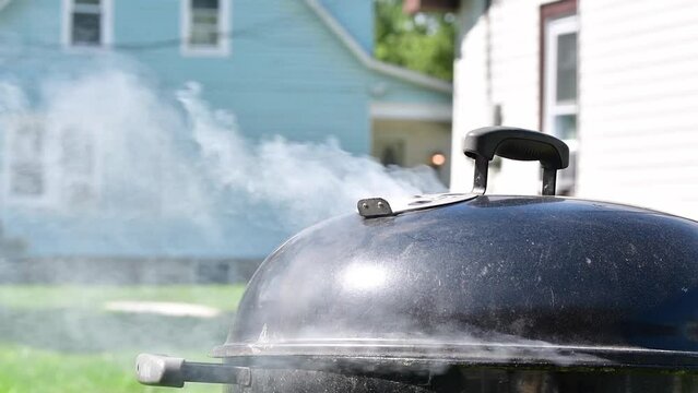 smoke from grill, bbq, summer activities, USA residential pass time theme