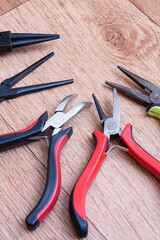 Various tools for working on wooden background