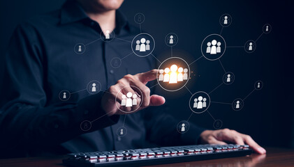 Businessman touching quality employees icon on virtual screen. officer looking for employee...