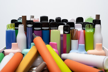 Synthetic nicotine concept. Various disposable electronic cigarettes. modern alternative smoking,...