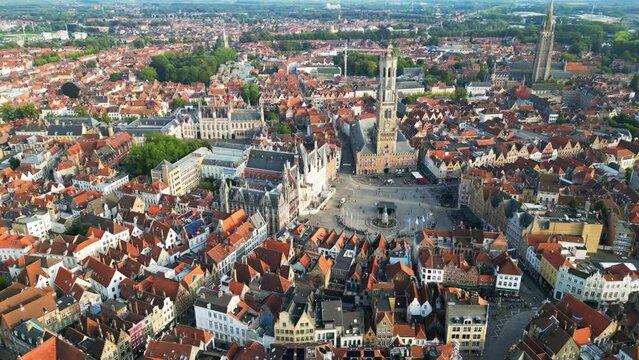 Bruges in Belgium, aerial view of the tower and central square in the city center of the famous medieval city. Unesco heritage