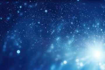 Fototapeta premium Blue bokeh light background, Christmas glowing bokeh confetti and sparkle texture overlay for your design. Sparkling blue dust abstract luxury decoration background.