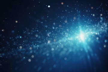 Fototapeta premium Blue bokeh light background, Christmas glowing bokeh confetti and sparkle texture overlay for your design. Sparkling blue dust abstract luxury decoration background.