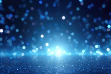 Fototapeta premium Blue bokeh light background, Christmas glowing bokeh confetti and sparkle texture overlay for your design. Sparkling blue dust abstract luxury decoration background.