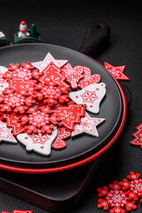 A beautiful Christmas composition consisting of ceramic plates, gingerbread and other elements