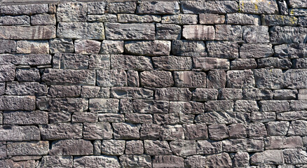 old stone wall with gray stones