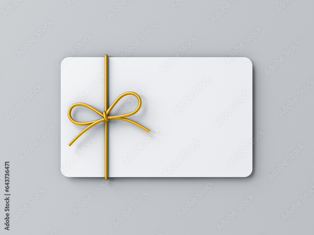 Poster blank minimal white gift card or gift voucher with golden ribbon rope bow isolated on grey backgroun
