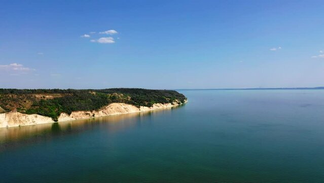 Ukraine, View from the mountain Pivikha on the Kremenchuk water reservoir near Svitlovodsk, Kirovograd region, Ukraine. Natural background in a sunny summer day.