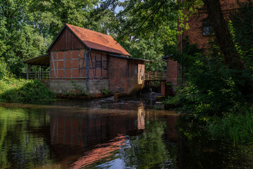 Fototapeta na wymiar old mill on the river