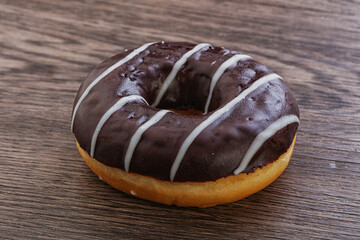 Glazed sweet tasty chocolate donut