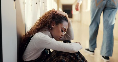 University, girl in hallway with stress and anxiety from school work, student loan debt and sad burnout. Depression, college problem and frustrated woman on campus floor with mental health crisis.