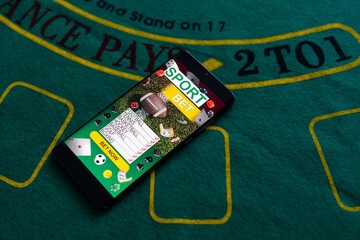 Betting on a smartphone on the background of the casino. Bets, sports betting, bookmaker.