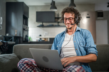 One man caucasian male freelancer work from home on laptop computer