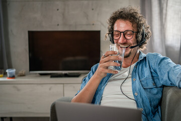 One man caucasian male freelancer work from home on laptop computer