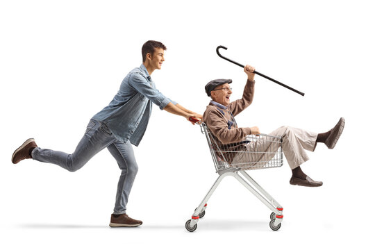Grandson pushing his grandfather inside a shopping cart - Powered by Adobe