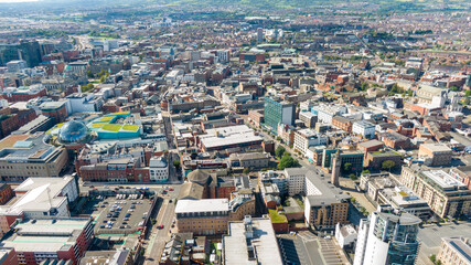 Aerial view on buildings and Lagan River in City center of Belfast Northern Ireland. Drone photo, high angle view of town