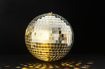 Disco ball with flashing lights on a black background