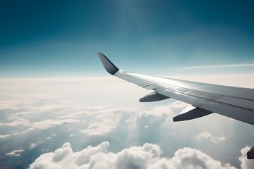 Fototapeta na wymiar Wing of plane gliding across blue sky. Generative AI