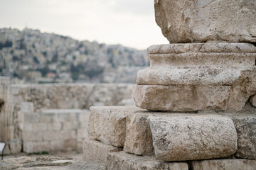 Closeup of the base of a monumental ancient column from a Roman building at the Amman Citadel, an...