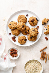 Oatmeal cranberry healthy homemade cookies with cinnamon and pecan nuts for breakfast