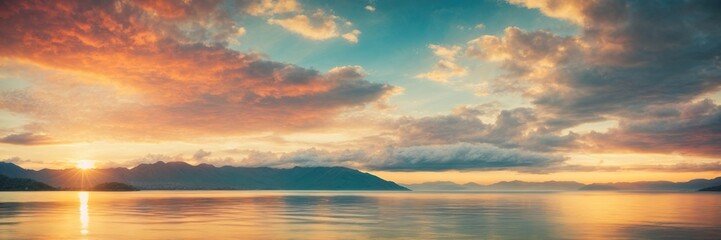 Tranquil Sunset Reflection on Lake with Dramatic Cloudscape