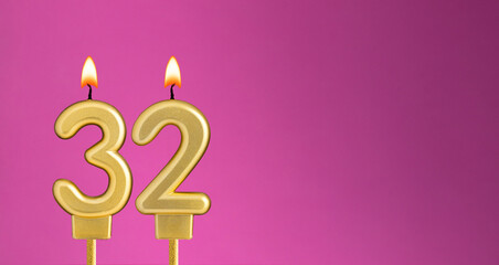 Candle number 32 in purple background - birthday card