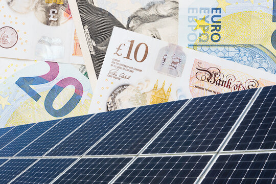 Solar panel texture. Environmental technology. Cco power supply background. Cell generating current. Renewable sources of energy. Photovoltaic panels pattern. Euro and pound bill electricity cost.
