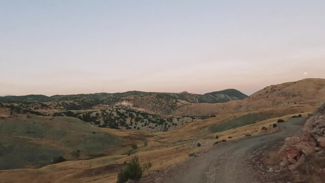 Road trip by car along the mountain roads and serpentines on sanset of Turkey.
