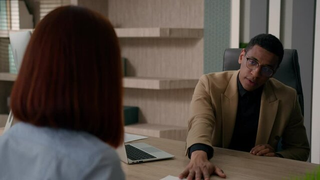 African American businessman male HR employer refuse applicant reject resume application of unemployed female candidate negative result job interview at business meeting fail no rejection unemployment