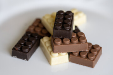 Bars of chocolate in the shape of blocks.