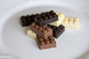 Bars of chocolate in the shape of blocks.
